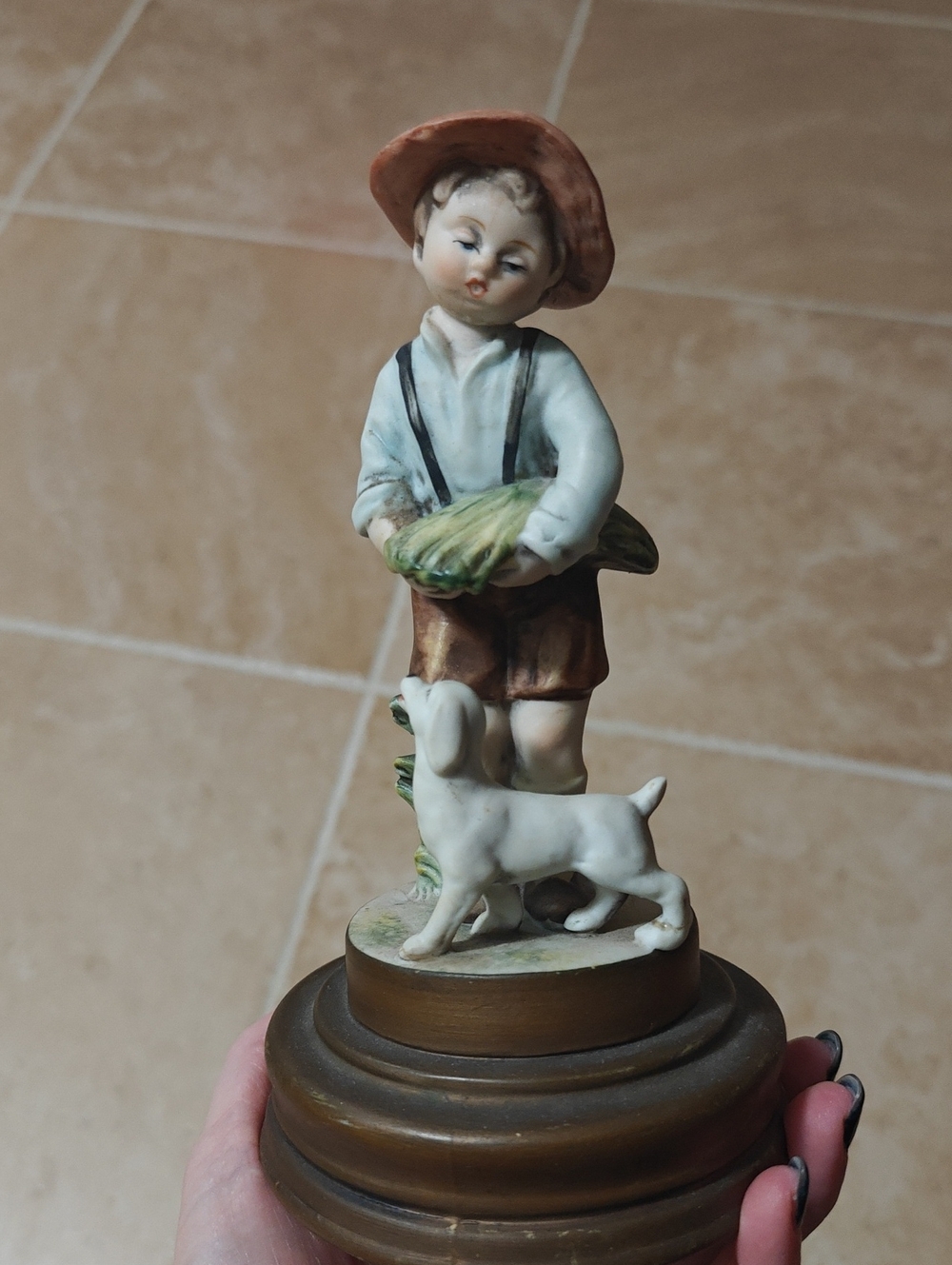 Hand-Painted Porcelain Boy & Dog Musical Sculpture in Cream, Brown & Green